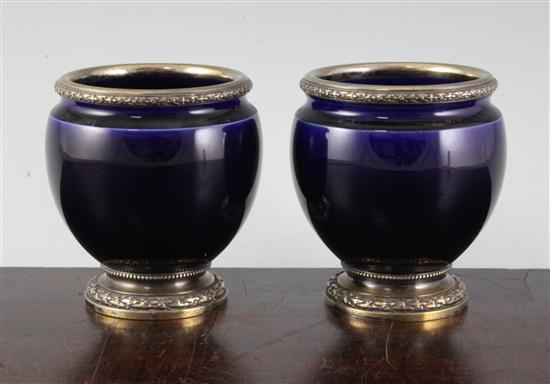 A pair of French silver mounted blue glazed porcelain vases, by Risler & Carre of Paris, 4.25in.